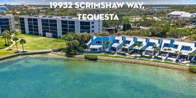 Rare Blue Water Views and a Private Boat Slip in the Heart of Tequesta